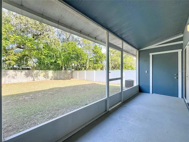 a picture of a bench in front of a wall