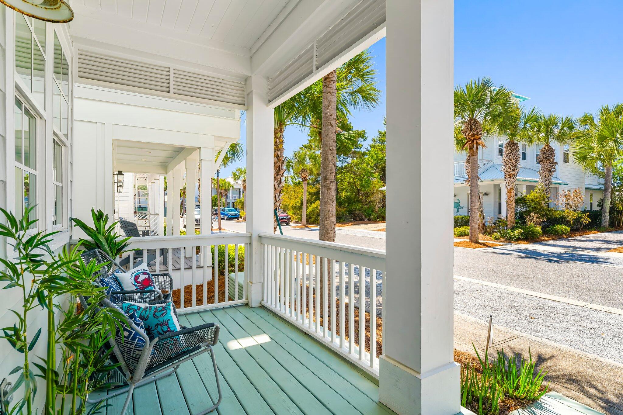 98 East Blue Crab Loop Inlet Beach, FL 32461 - Photo 3 of 74 a view of a balcony with potted plants