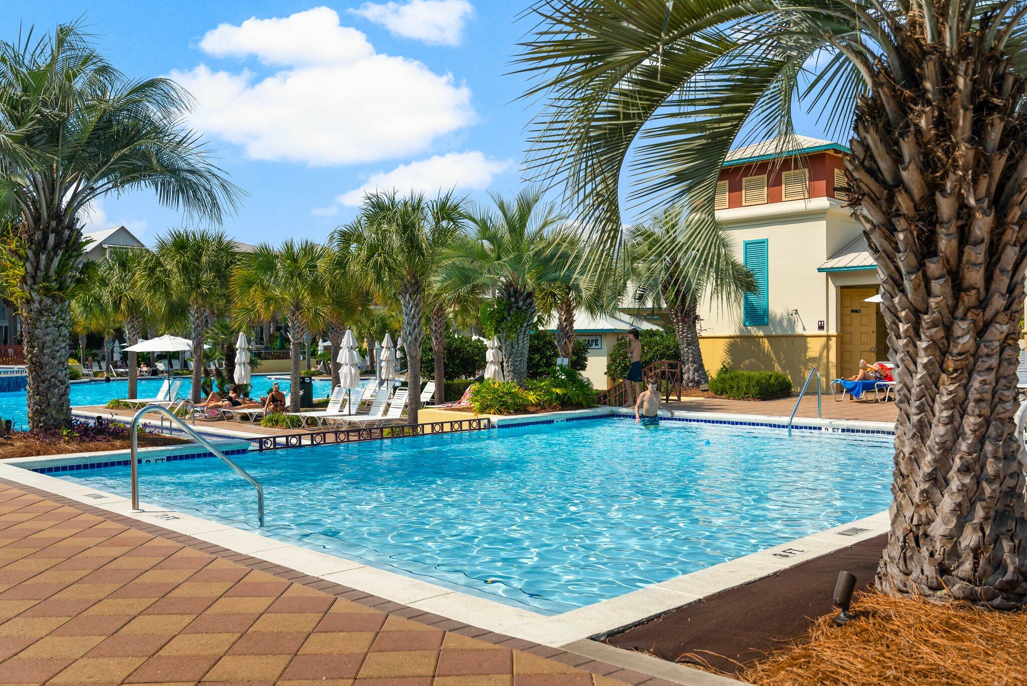 98 East Blue Crab Loop Inlet Beach, FL 32461 - Photo 51 of 74 a view of a swimming pool with a lounge chairs