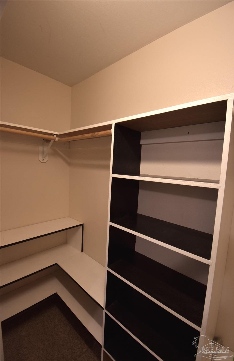 7195 Heath Road Milton, FL 32570 - Photo 14 of 33 a view of walk in closet