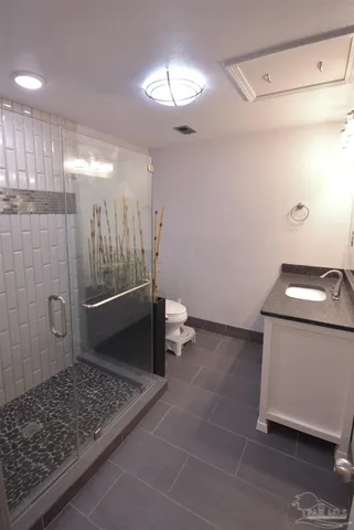 a bathroom with a sink and a toilet