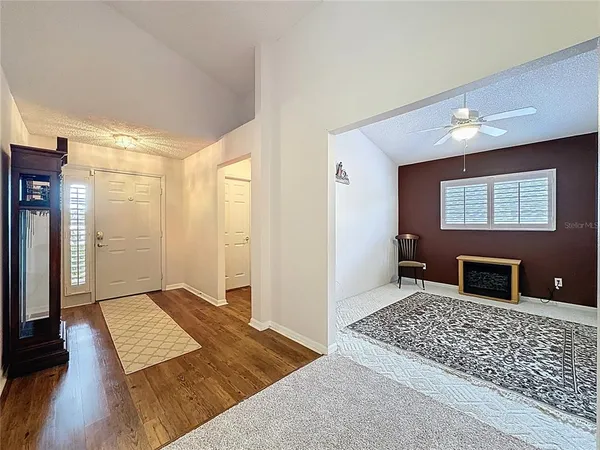 an aerial view of a houses with outdoor space and lake view