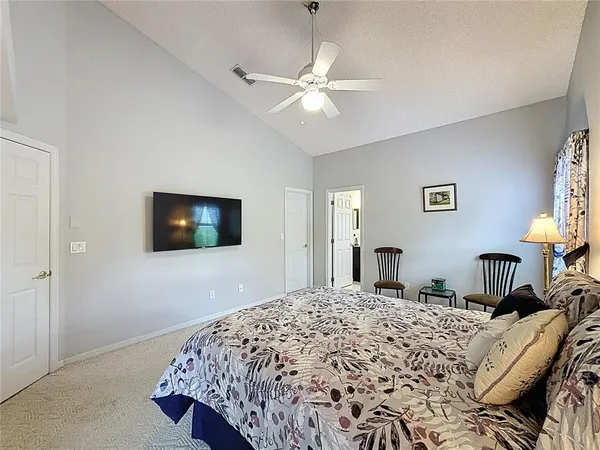 a view of a room with wooden floor and iron fence