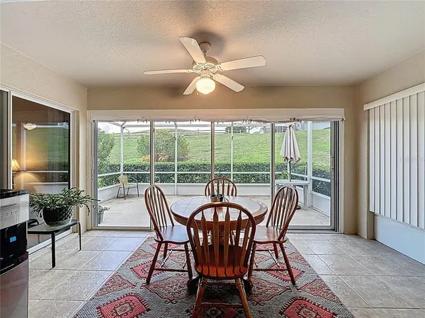 a view of a dining room and furniture window and outside view