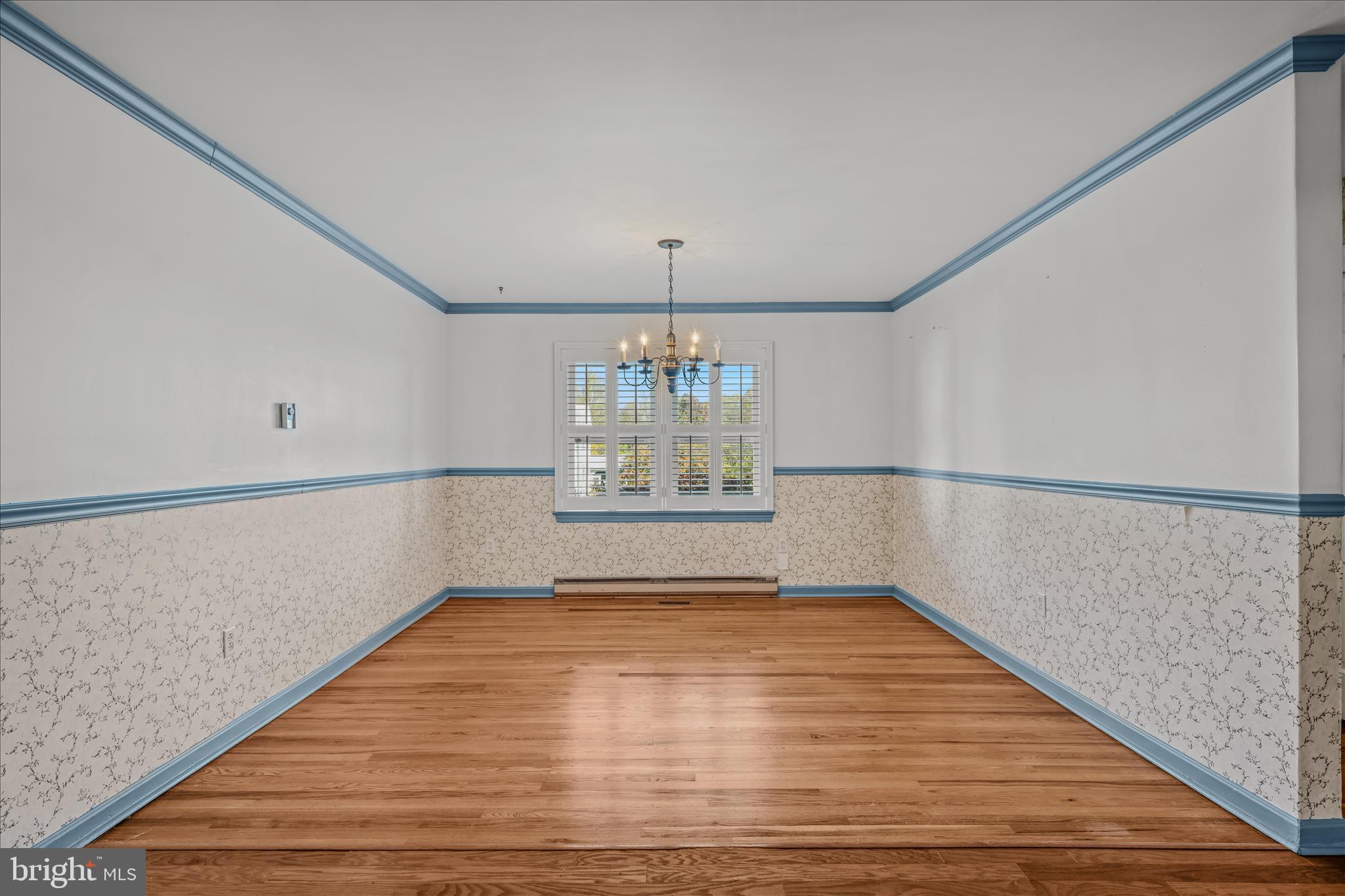 5694 Tabler Station Road Inwood, WV 25428 - Photo 12 of 37 a view of an empty room with a window