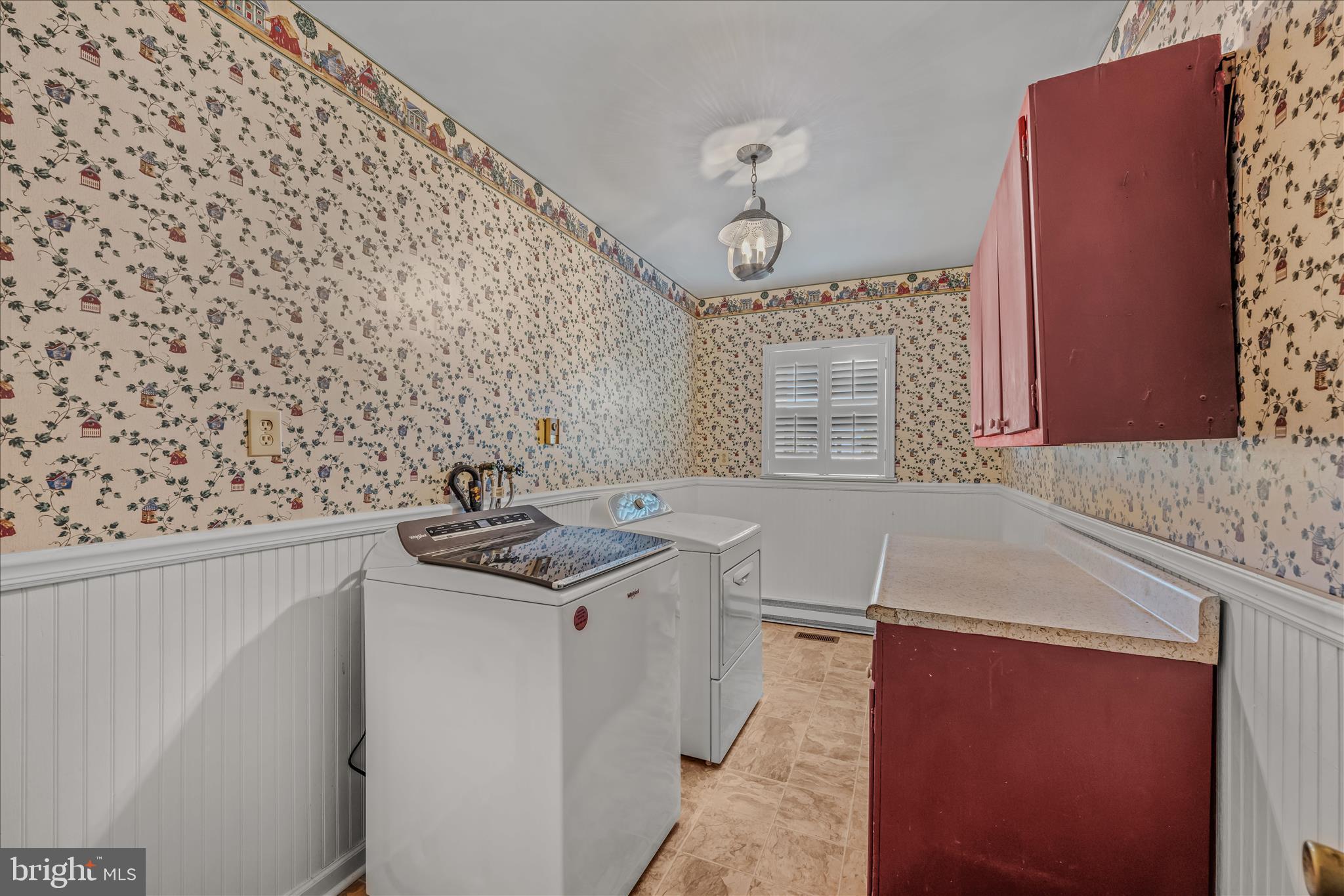 5694 Tabler Station Road Inwood, WV 25428 - Photo 16 of 37 a bathroom with a sink and a mirror