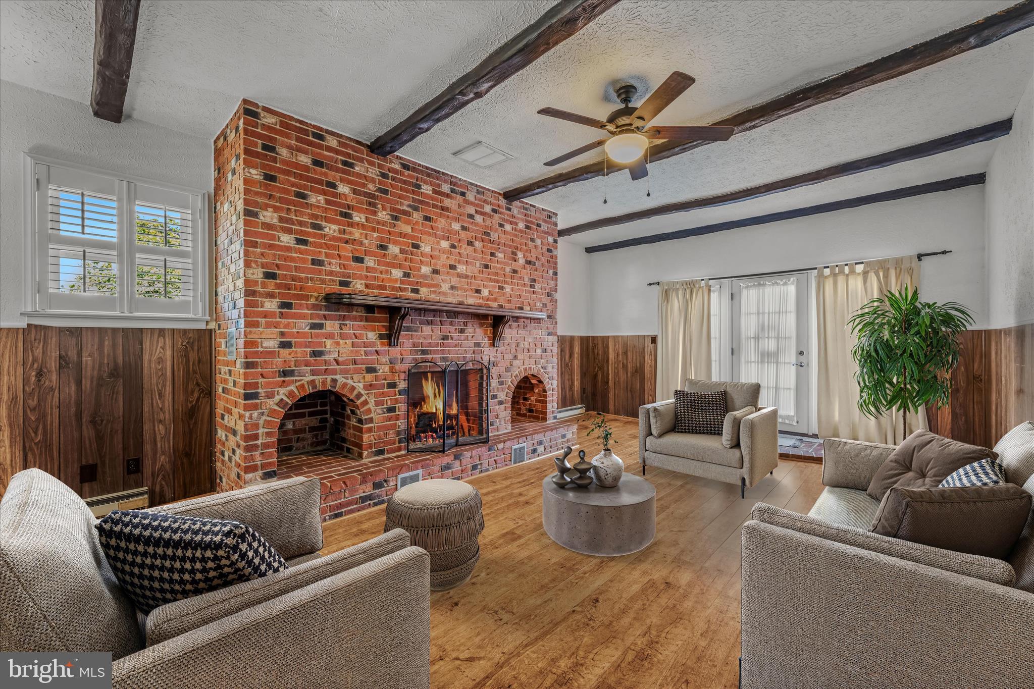 5694 Tabler Station Road Inwood, WV 25428 - Photo 17 of 37 a living room with furniture and a fireplace