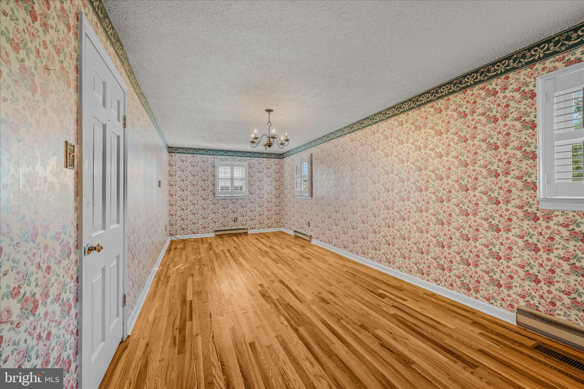 5694 Tabler Station Road Inwood, WV 25428 - Photo 23 of 37 a view of a room with wooden floor and staircase