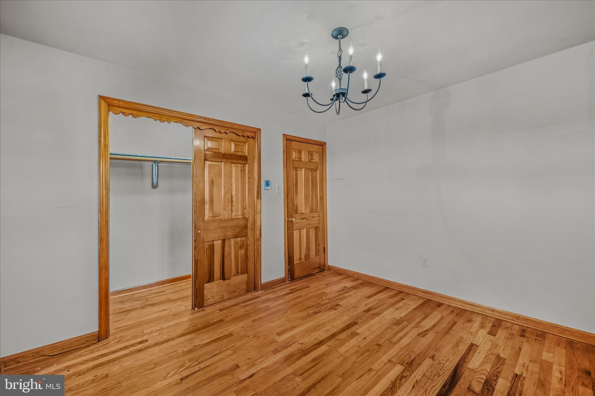 5694 Tabler Station Road Inwood, WV 25428 - Photo 26 of 37 a view of empty room with wooden floor