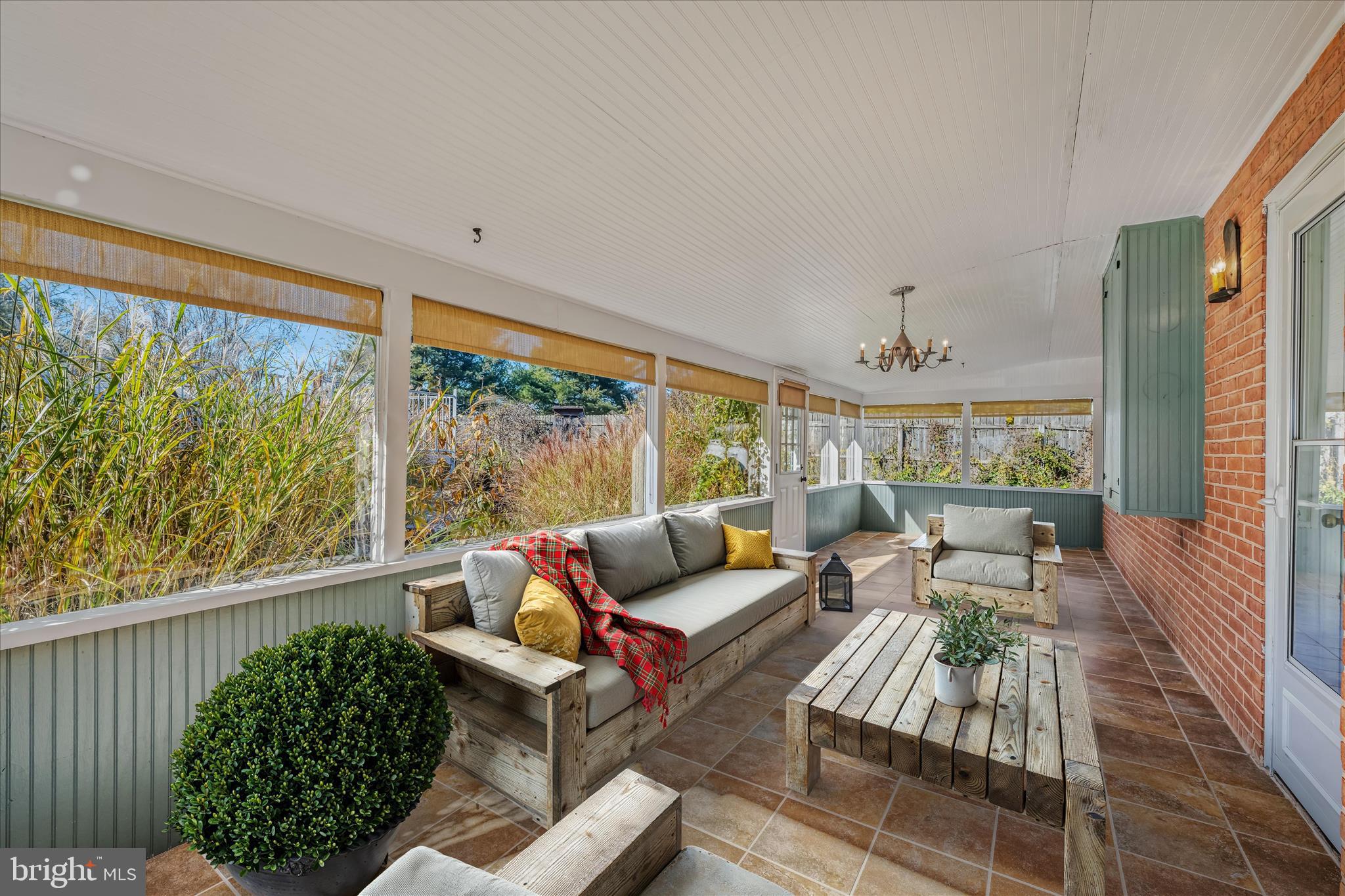 5694 Tabler Station Road Inwood, WV 25428 - Photo 27 of 37 a living room with furniture and a large window