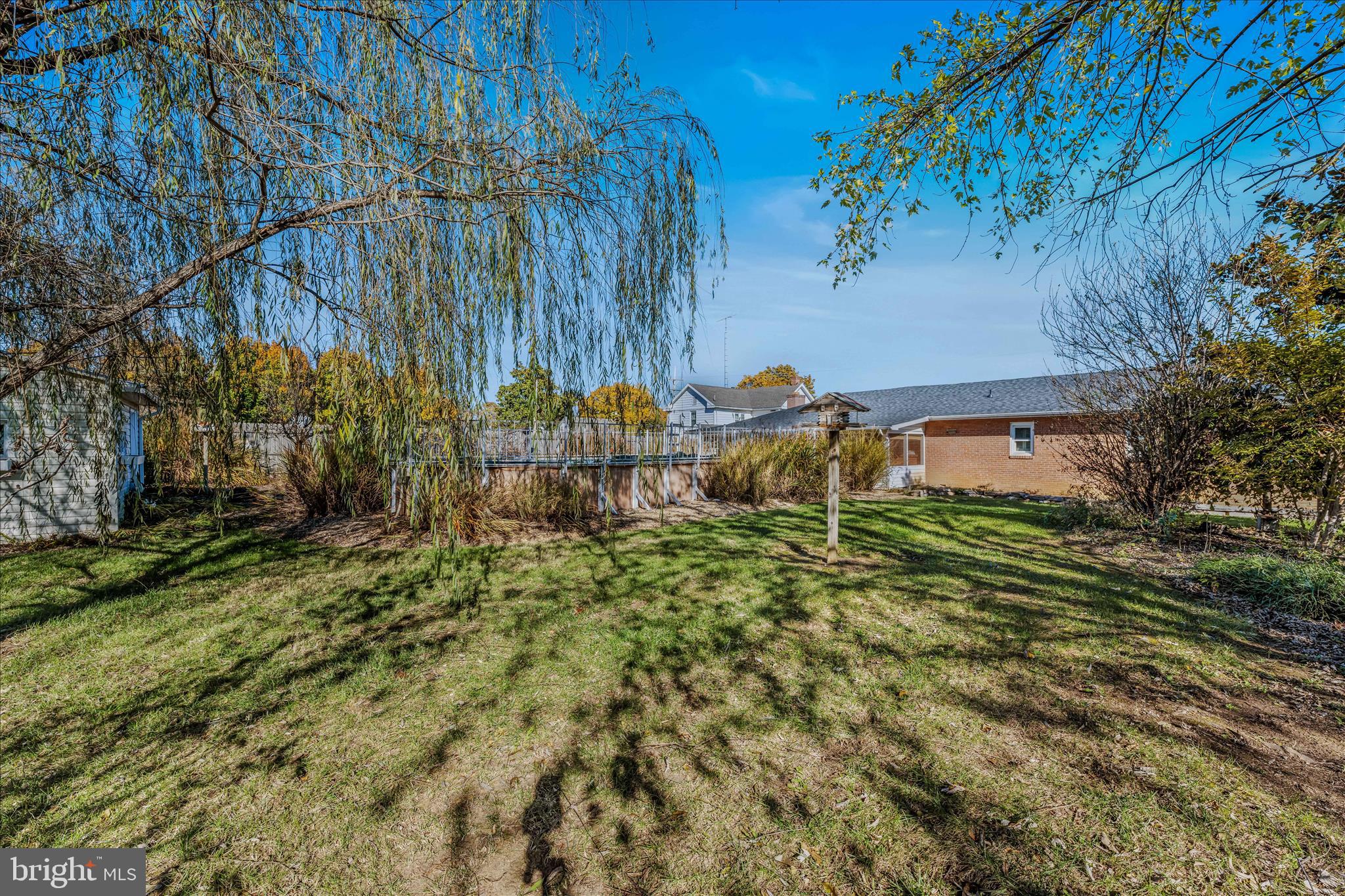 5694 Tabler Station Road Inwood, WV 25428 - Photo 35 of 37 a backyard of a house with lots of green space