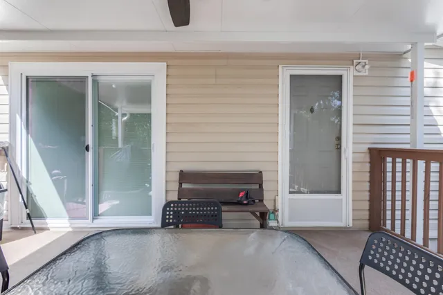 a view of a livingroom with furniture and a fireplace