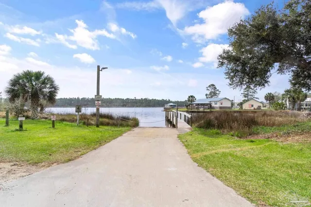 a view of a garden and lake