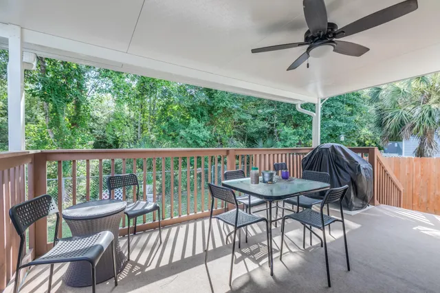 a view of a balcony with furniture