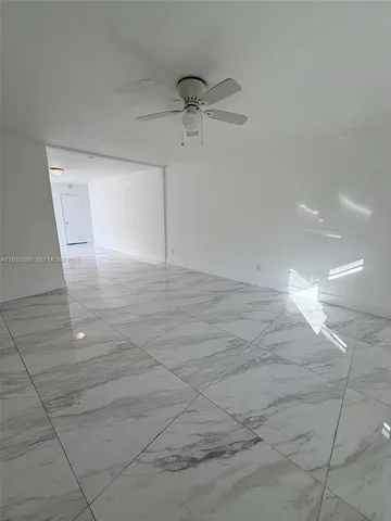 a view of a room with an empty space