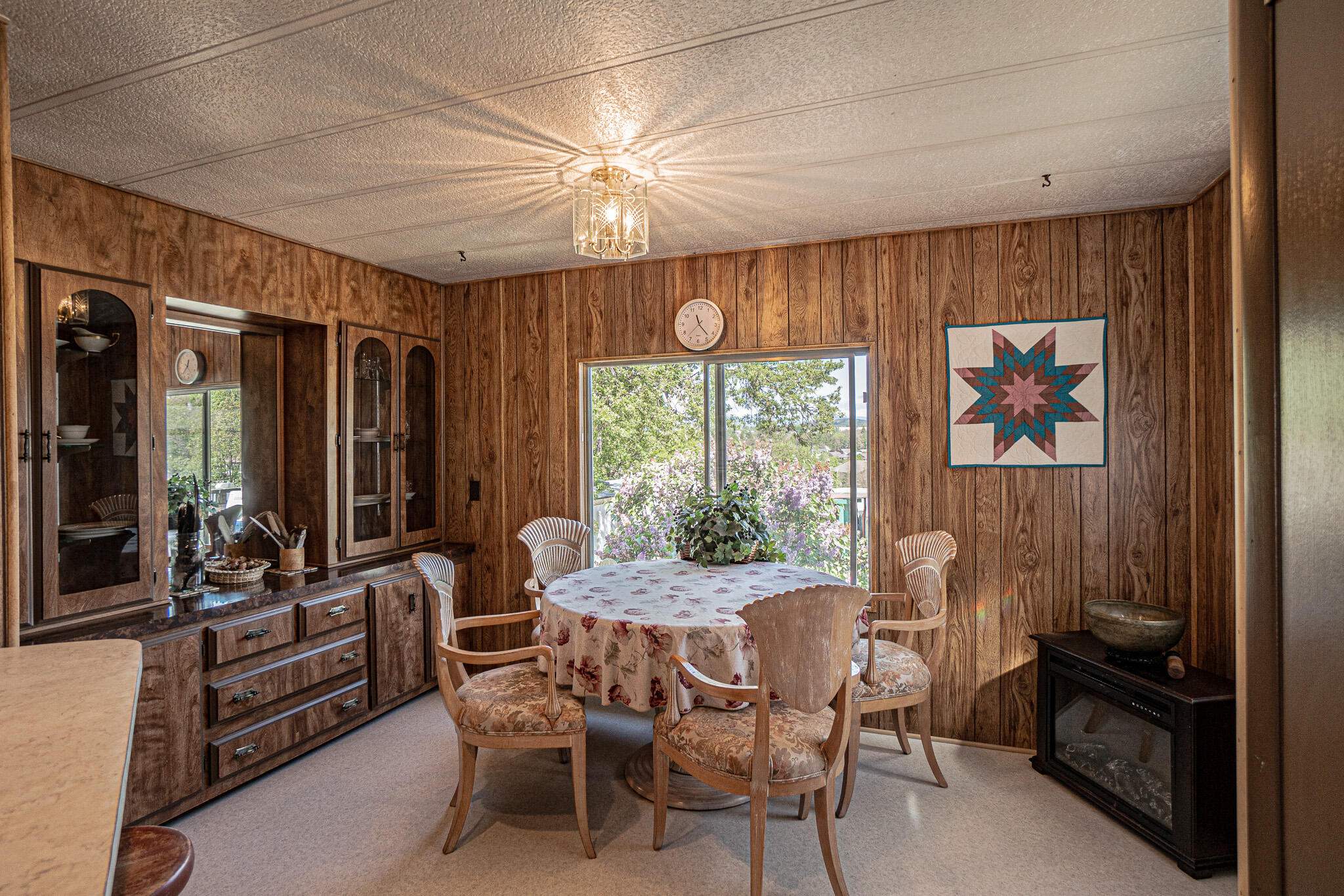 421 Stevens Road, Unit 26 Eagle Point, OR 97524 - Photo 6 of 23 a view of a dining room with furniture window and outside view