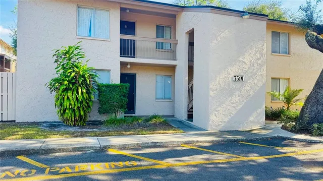 a view of a house with a swimming pool