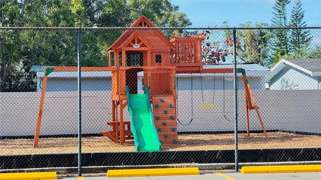a view of a balcony with yard