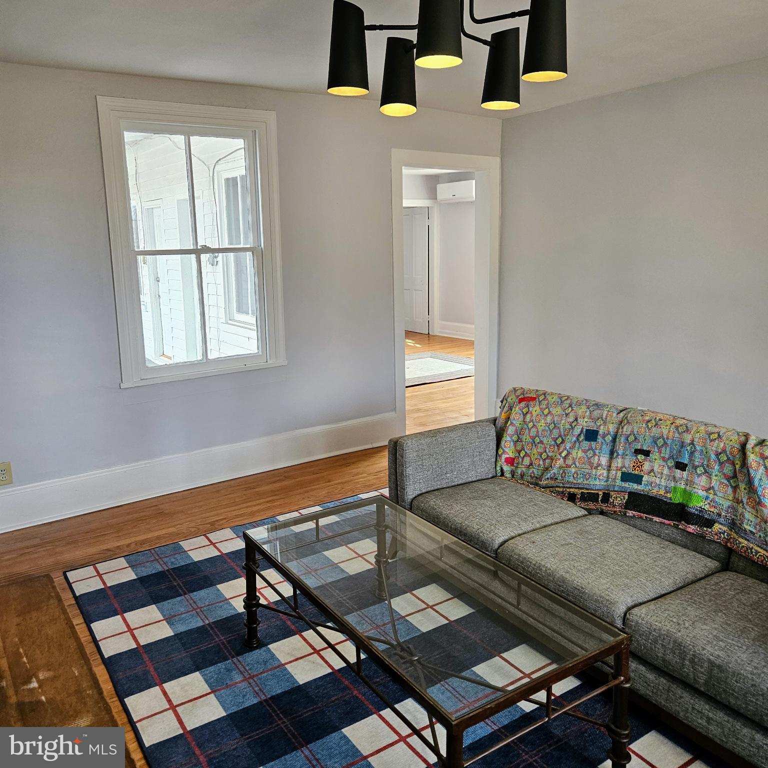 15660 Reva Road Reva, VA 22735 - Photo 18 of 40 a living room with a couch and a window