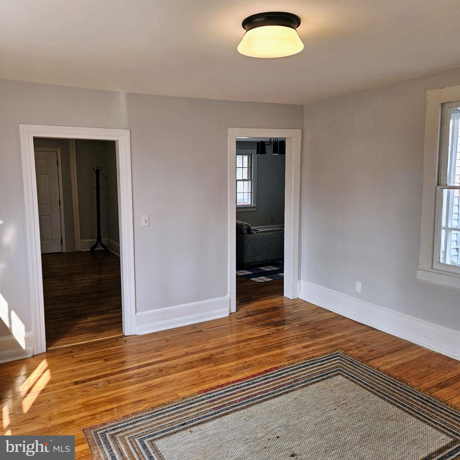 15660 Reva Road Reva, VA 22735 - Photo 22 of 40 an empty room with wooden floor closet and windows