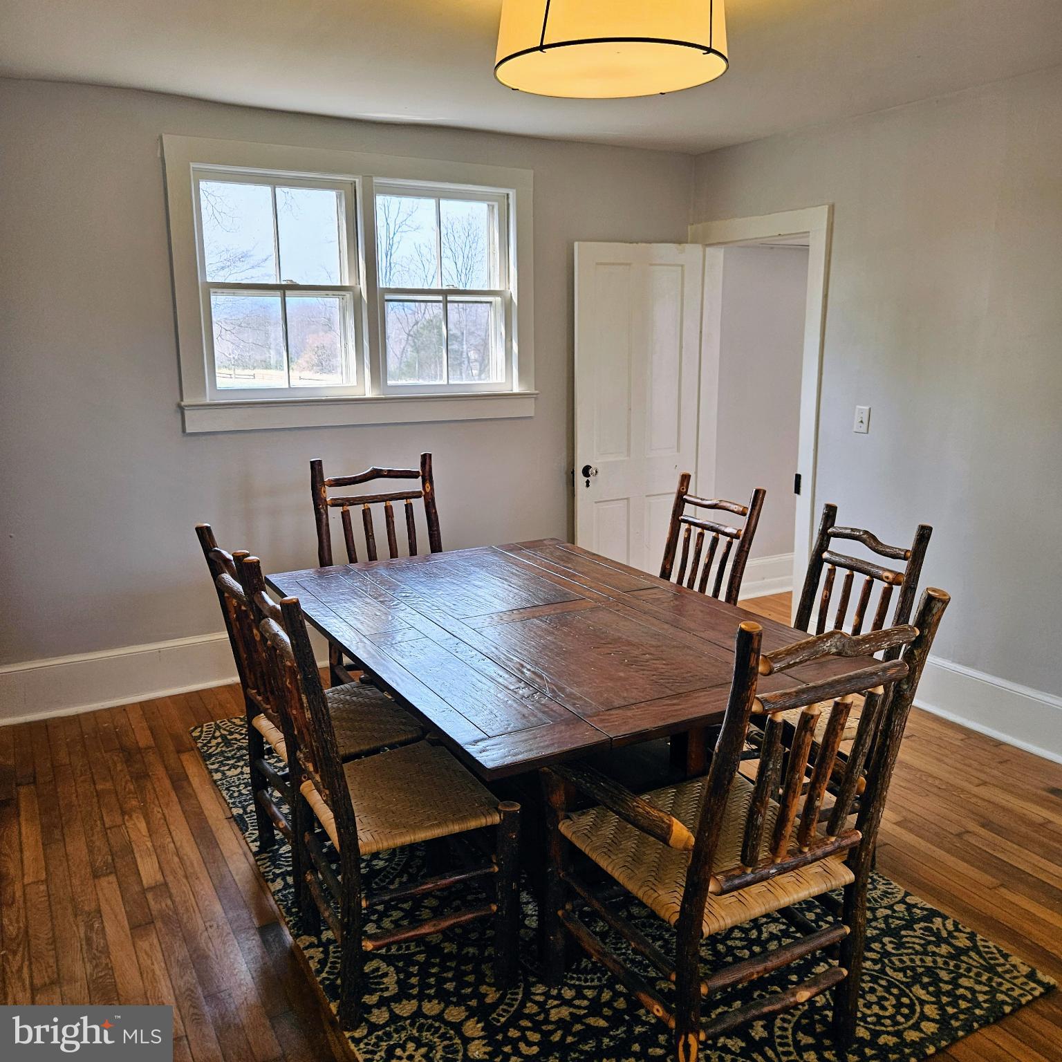 15660 Reva Road Reva, VA 22735 - Photo 24 of 40 a view of a dining room with furniture and wooden floor