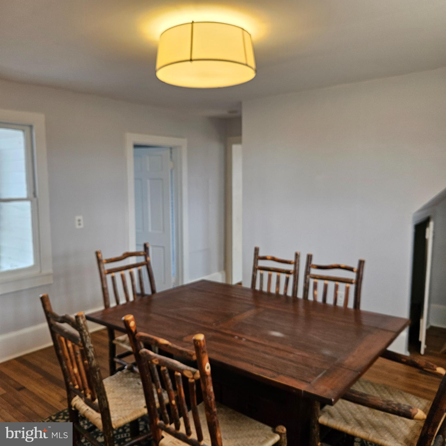 15660 Reva Road Reva, VA 22735 - Photo 25 of 40 a view of a dining room with furniture and wooden floor
