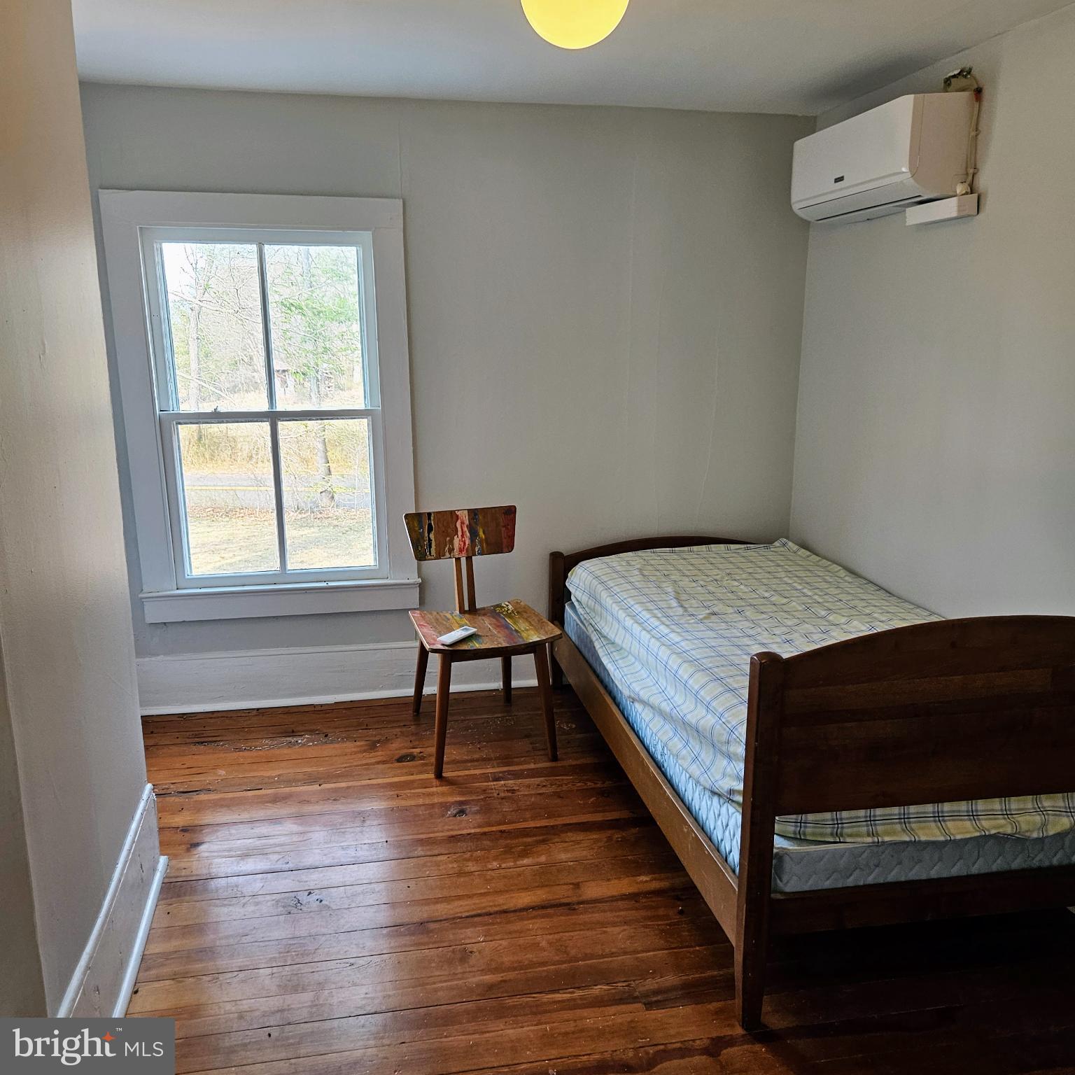 15660 Reva Road Reva, VA 22735 - Photo 33 of 40 a bedroom with a bed and a window