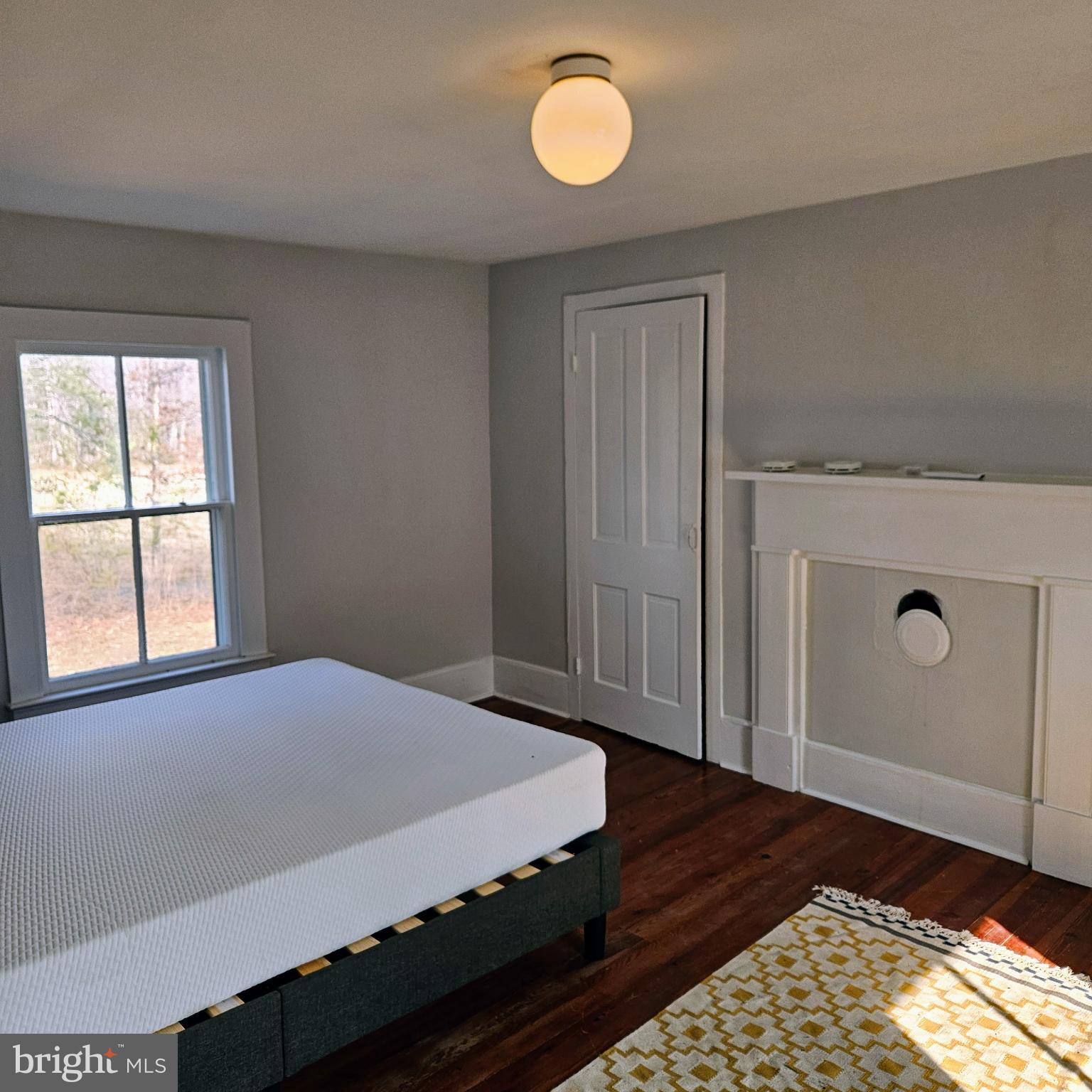 15660 Reva Road Reva, VA 22735 - Photo 35 of 40 a bedroom with a bed and a window