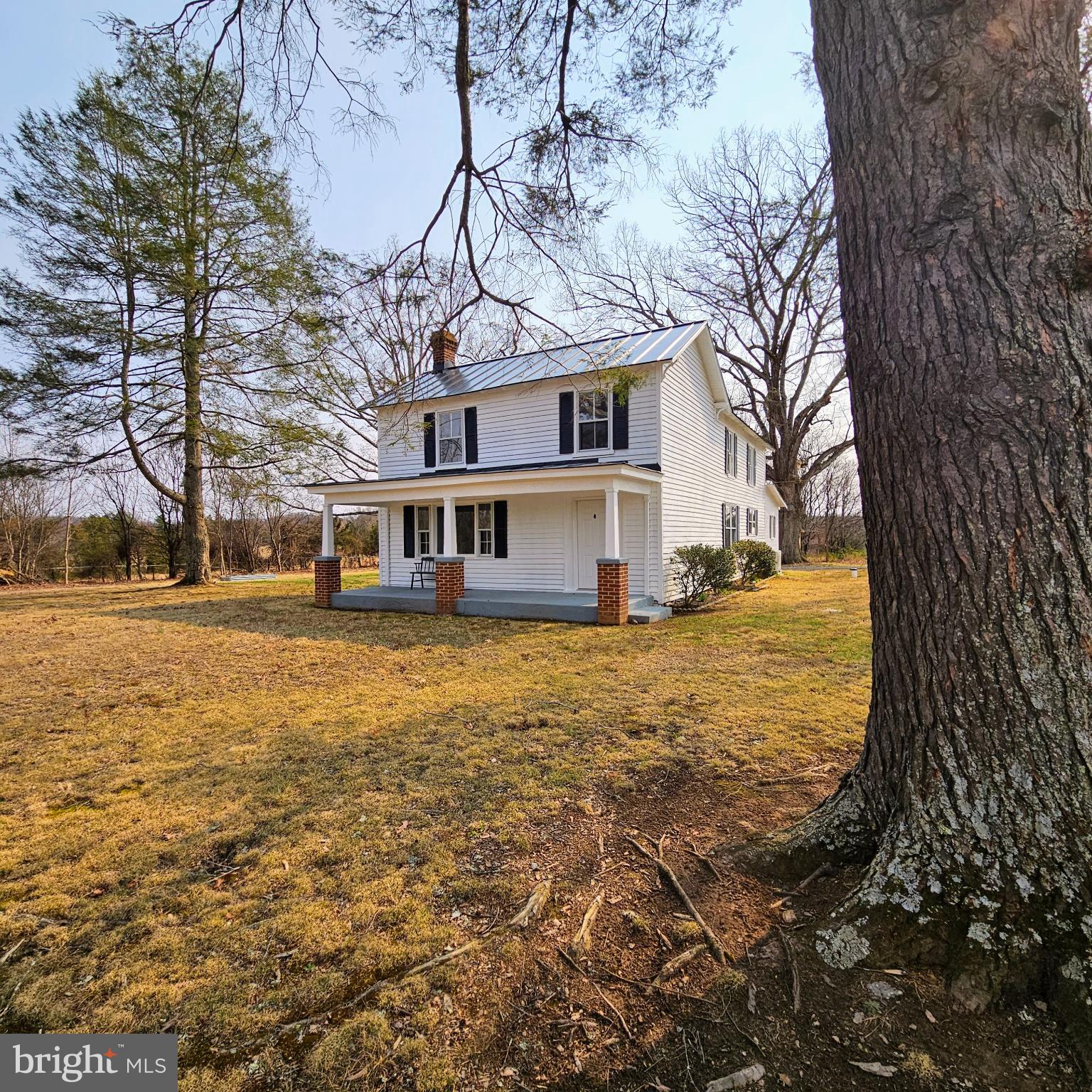 15660 Reva Road Reva, VA 22735 - Photo 6 of 40 a front view of a house with a yard