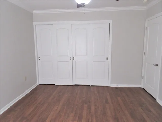 a view of room with hardwood floor