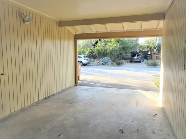 a view of a room with a large window