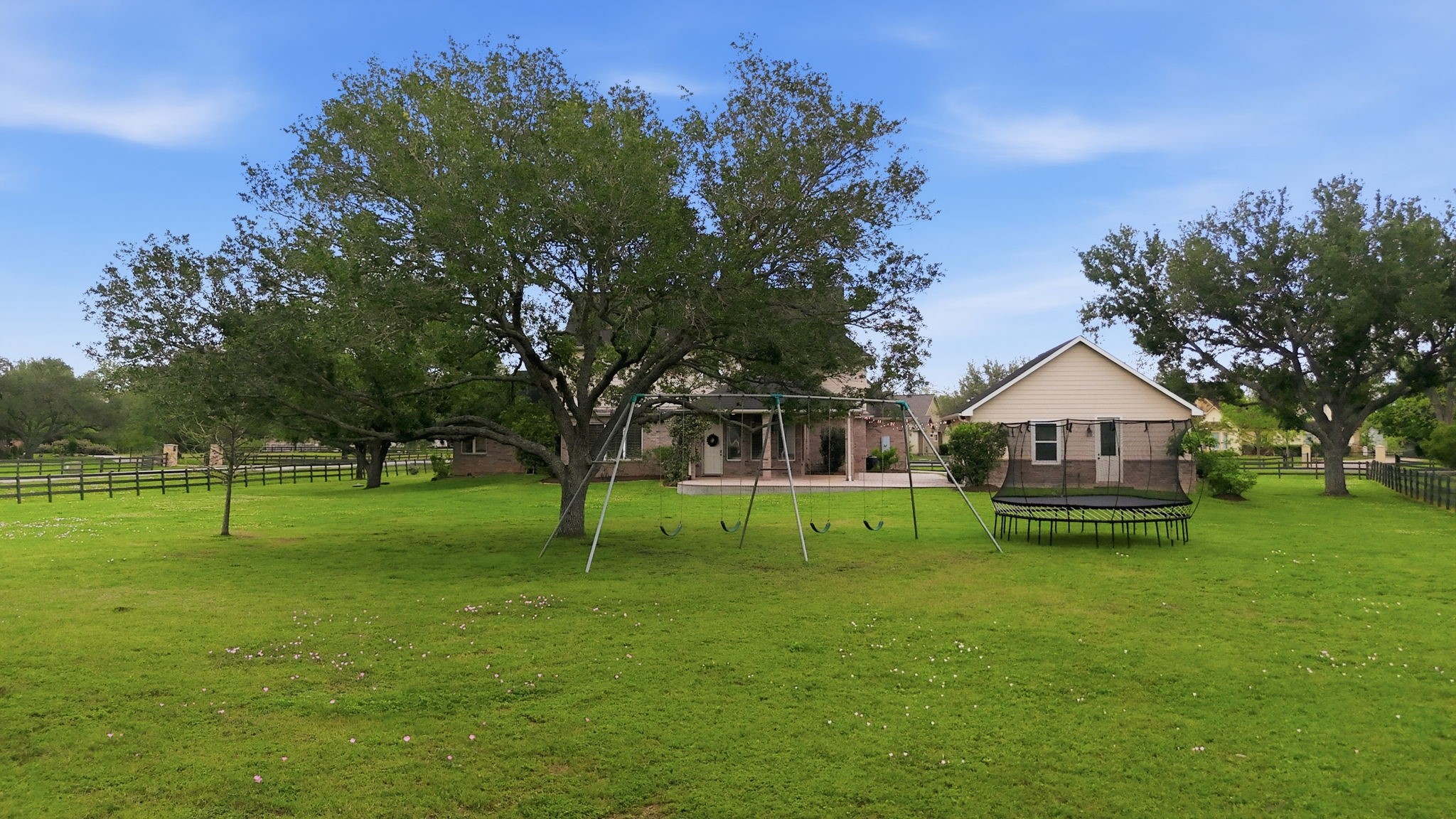 4535 Box Turtle Lane Fulshear, TX 77441 - Photo 49 of 49 This backyard offers space for everything you need, whether it’s entertaining, play, gardening, or simply enjoying the outdoors your way.