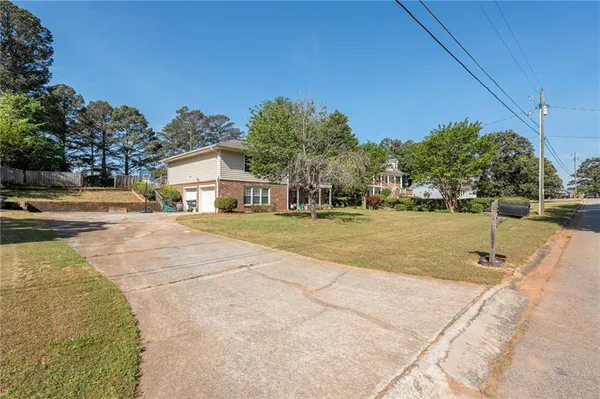 $320,000 | 2491 Highland Golf Course Circle Southeast, Conyers, GA 30013