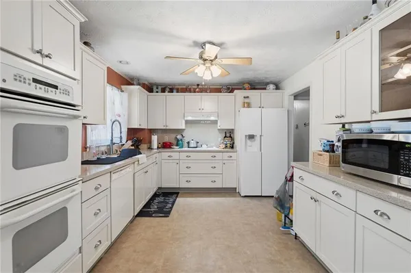 $320,000 | 2491 Highland Golf Course Circle Southeast, Conyers, GA 30013