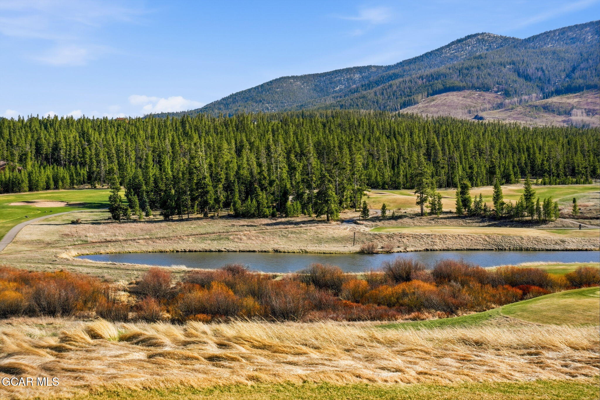 27 County Road Tabernash, CO 80478 - Photo 58 of 96 a view of a swimming pool with a house