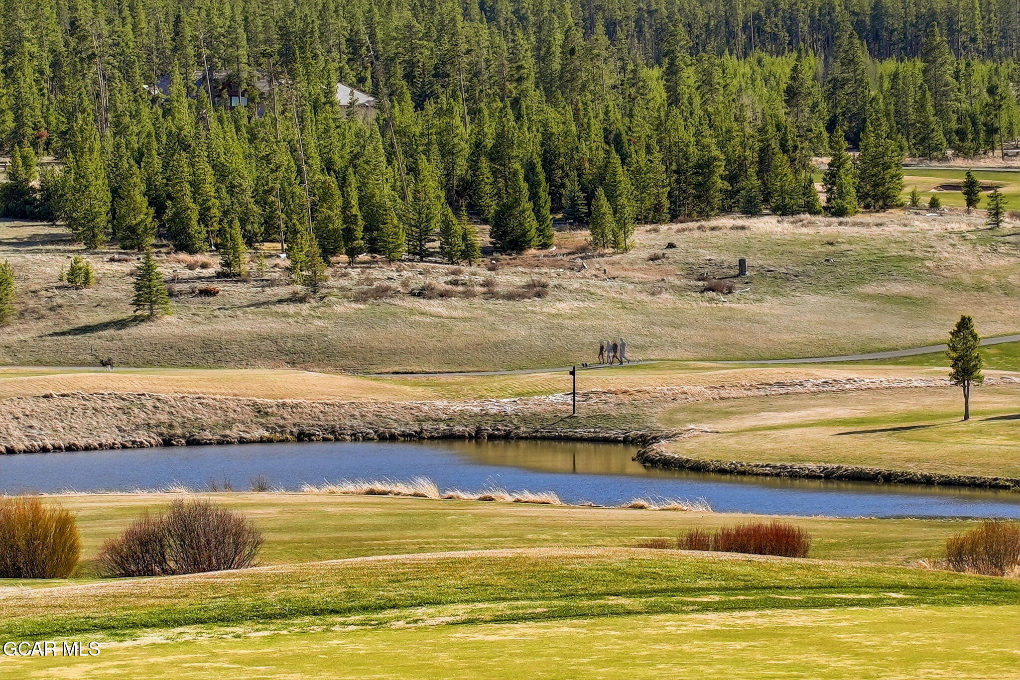 27 County Road Tabernash, CO 80478 - Photo 69 of 96 a view of a swimming pool with a lounge chair
