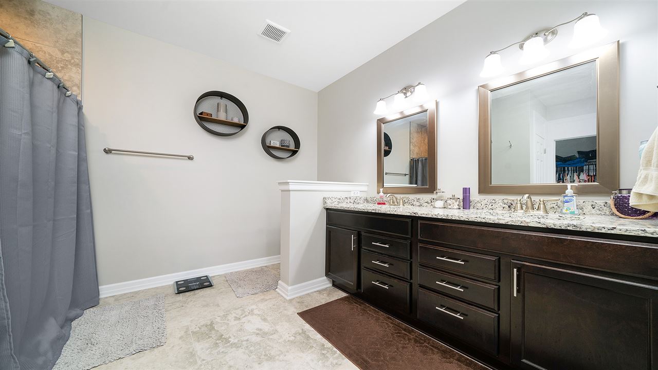 2525 Rogene Drive Oregon, IL 61061 - Photo 21 of 36 a bathroom with a sink and a mirror