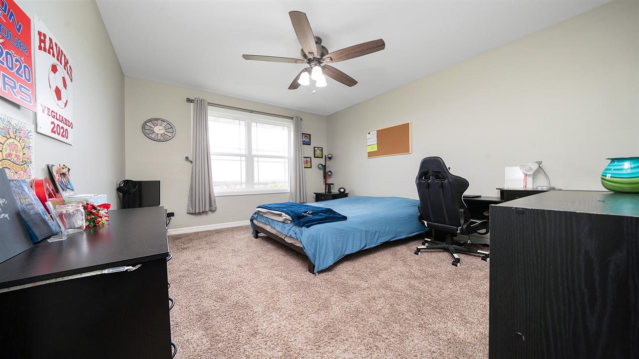 2525 Rogene Drive Oregon, IL 61061 - Photo 22 of 36 a living room with furniture and a window