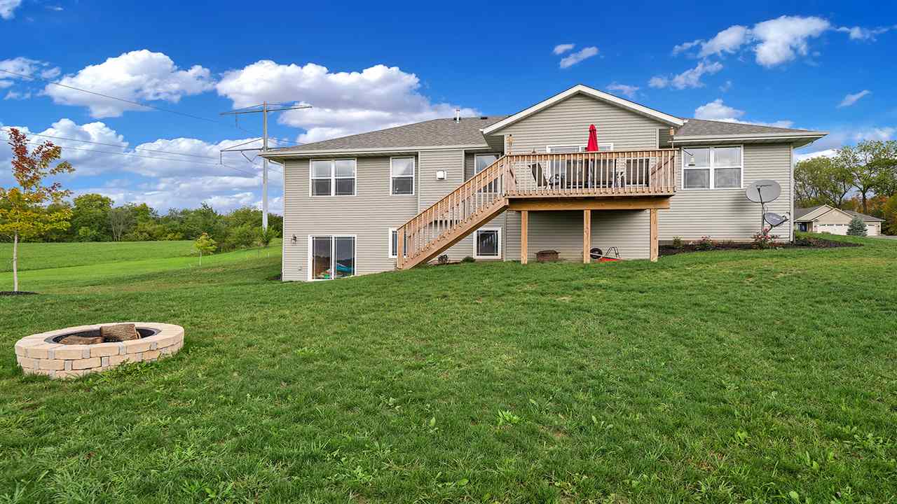 2525 Rogene Drive Oregon, IL 61061 - Photo 33 of 36 a front view of a house with a yard and garage