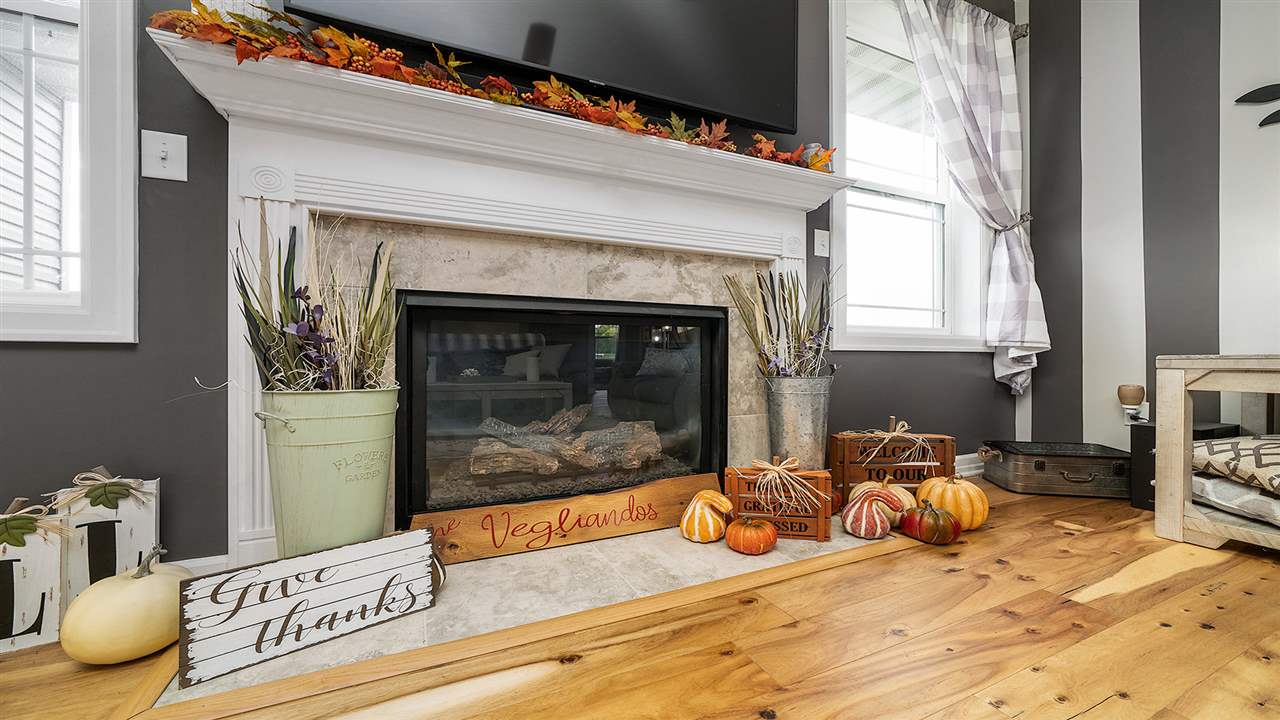 2525 Rogene Drive Oregon, IL 61061 - Photo 9 of 36 a bedroom with a bed and a fireplace