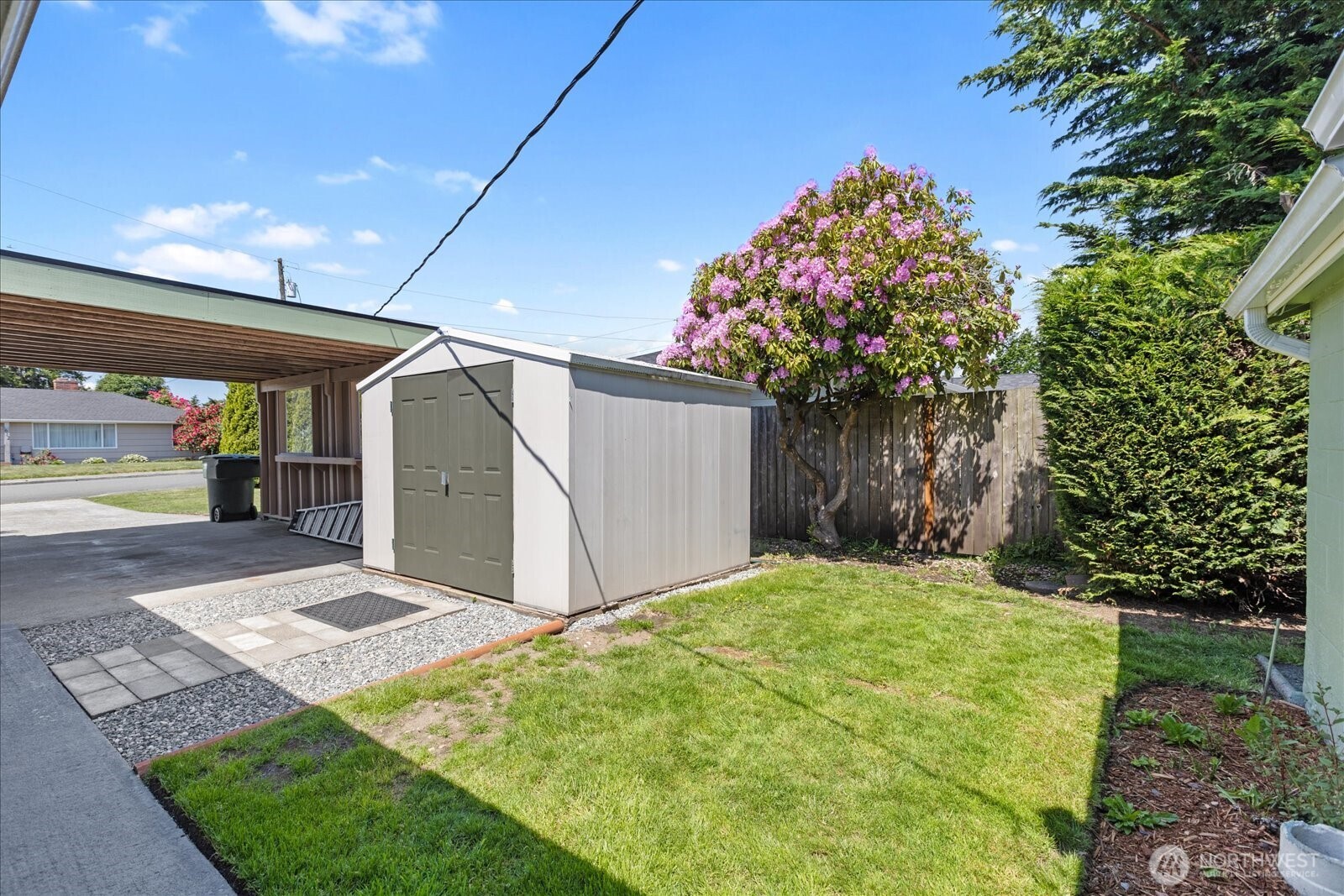 626 Legion Drive Everett, WA 98201 - Photo 12 of 38 a front view of a house with garden