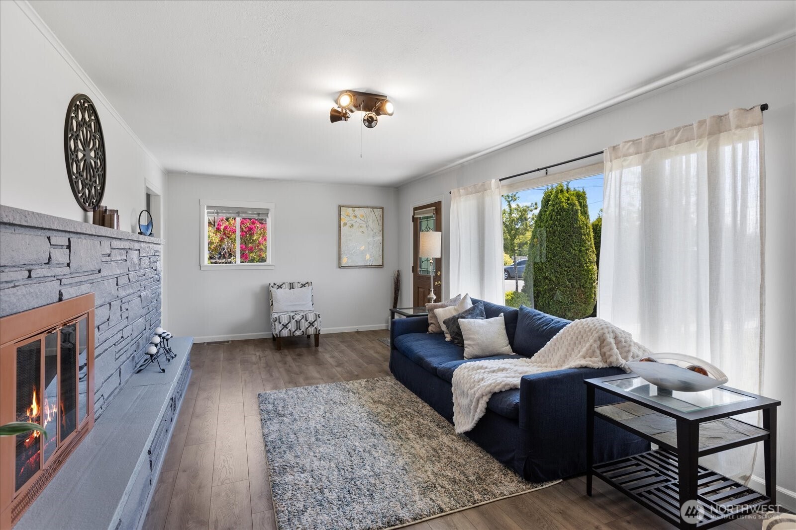 626 Legion Drive Everett, WA 98201 - Photo 13 of 38 a living room with furniture and a fireplace