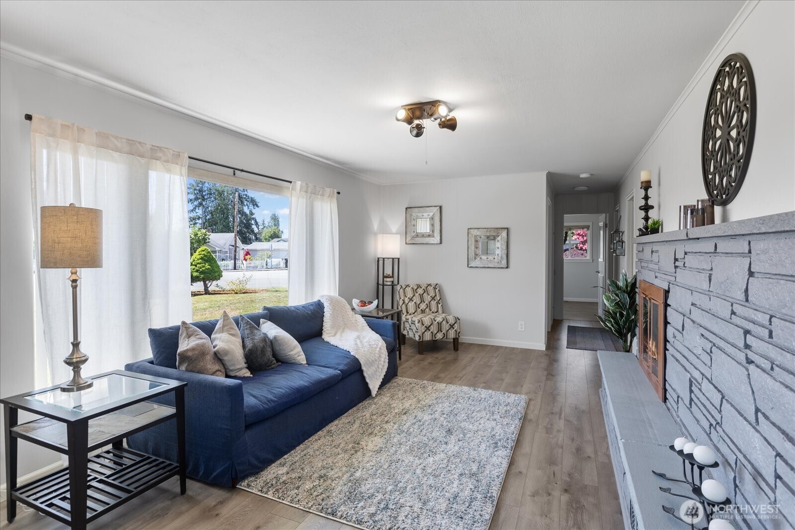 626 Legion Drive Everett, WA 98201 - Photo 15 of 38 a living room with furniture and a fireplace