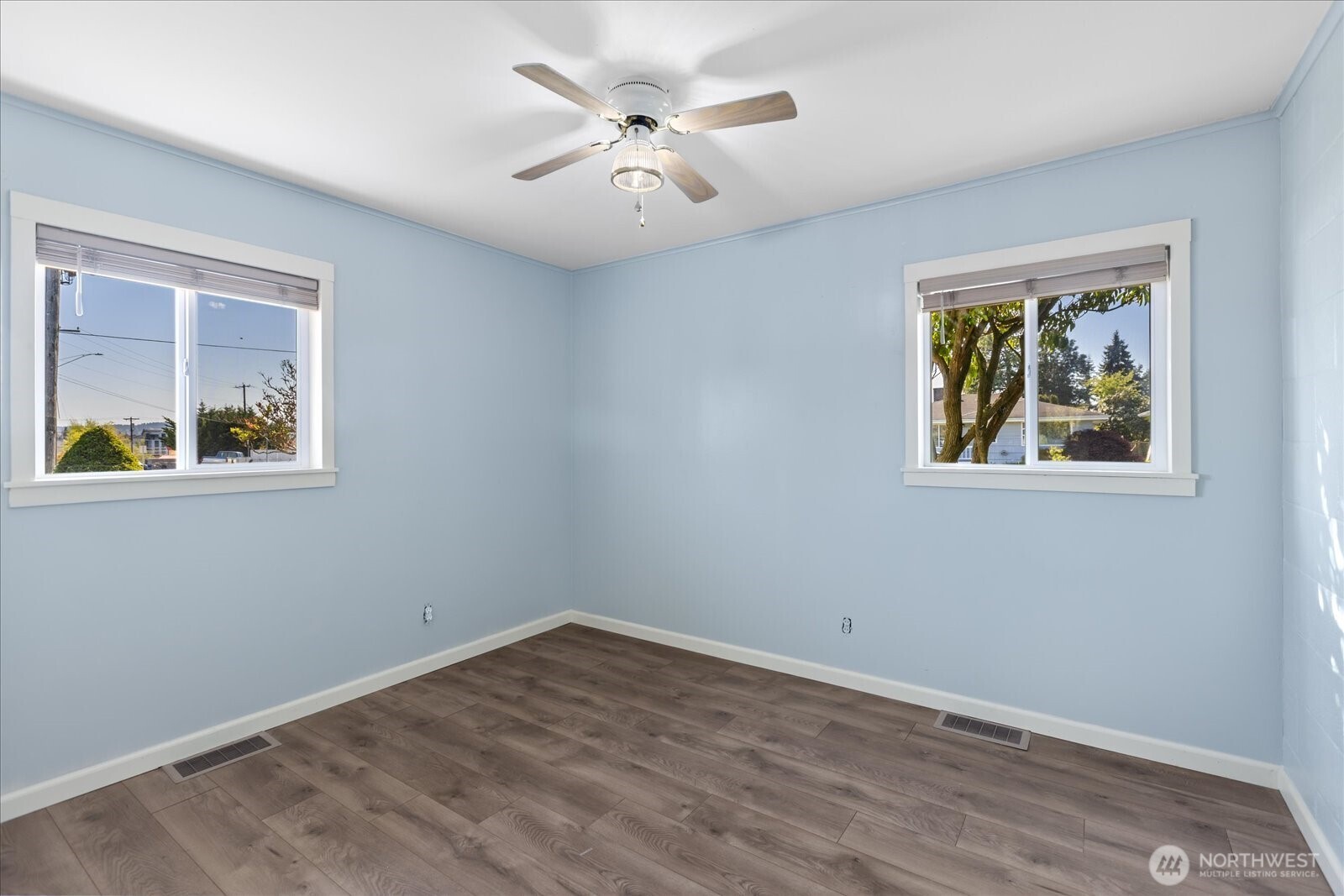 626 Legion Drive Everett, WA 98201 - Photo 26 of 38 a view of empty room with wooden floor