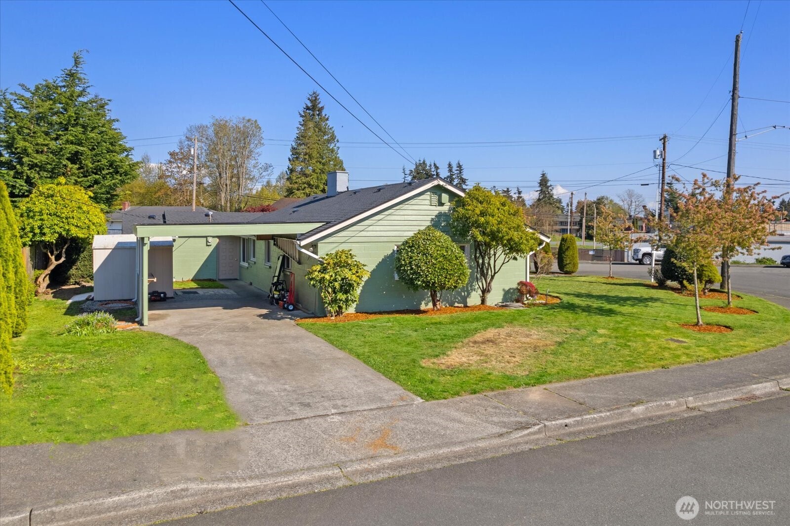 626 Legion Drive Everett, WA 98201 - Photo 7 of 38 a view of a house next to a yard