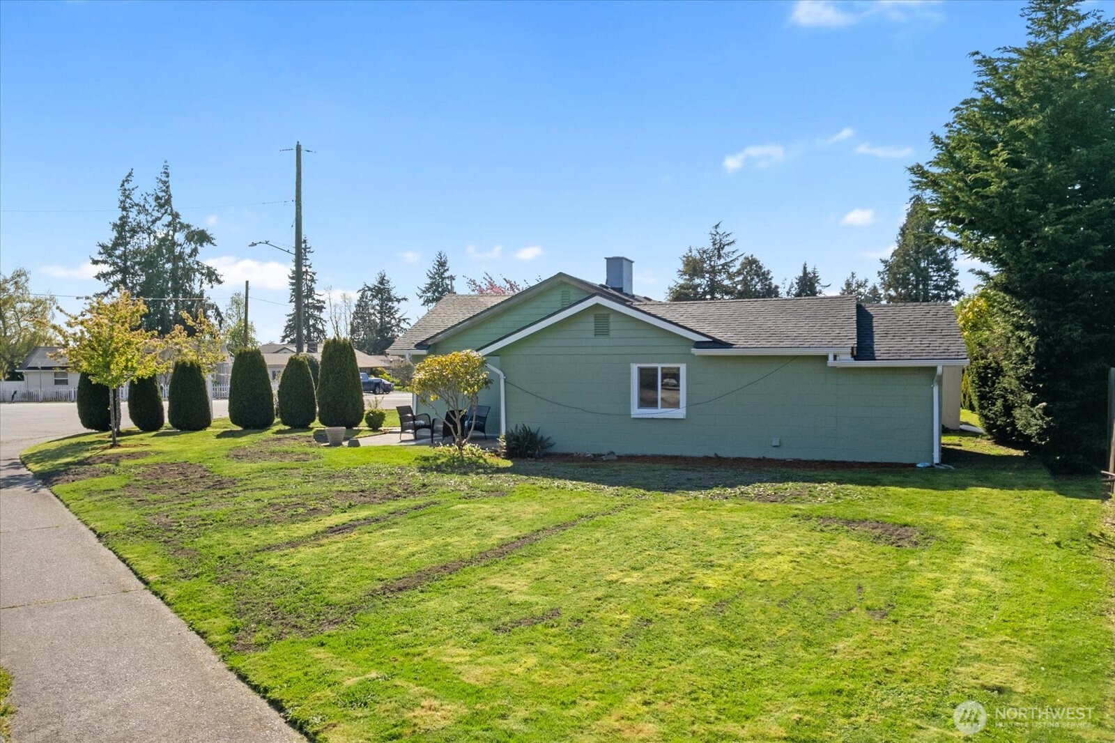 626 Legion Drive Everett, WA 98201 - Photo 9 of 38 a view of a house with a yard and basketball court