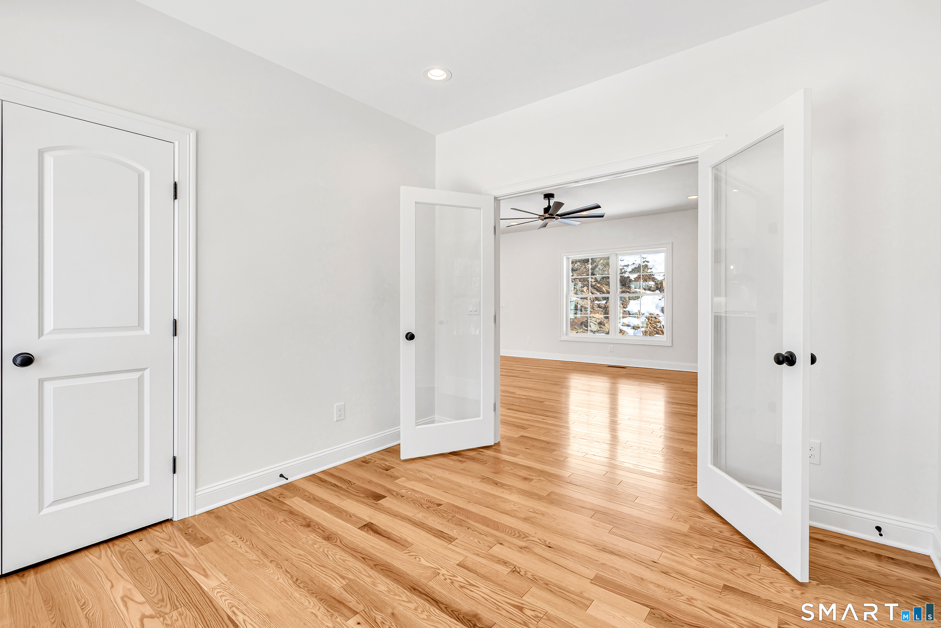 15 Hunting Ridge Road Middlebury, CT 06762 - Photo 12 of 41 a view of empty room with wooden floor