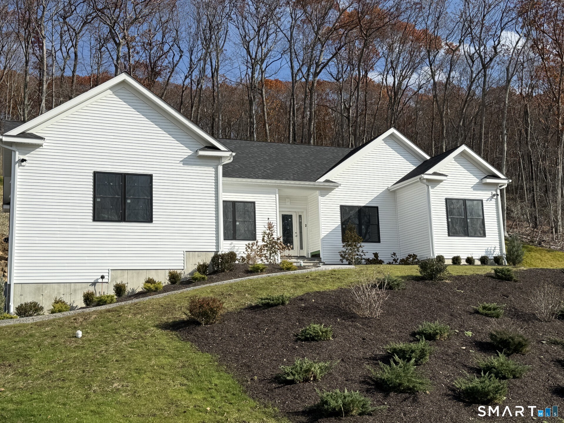 15 Hunting Ridge Road Middlebury, CT 06762 - Photo 2 of 41 a view of a house with a yard