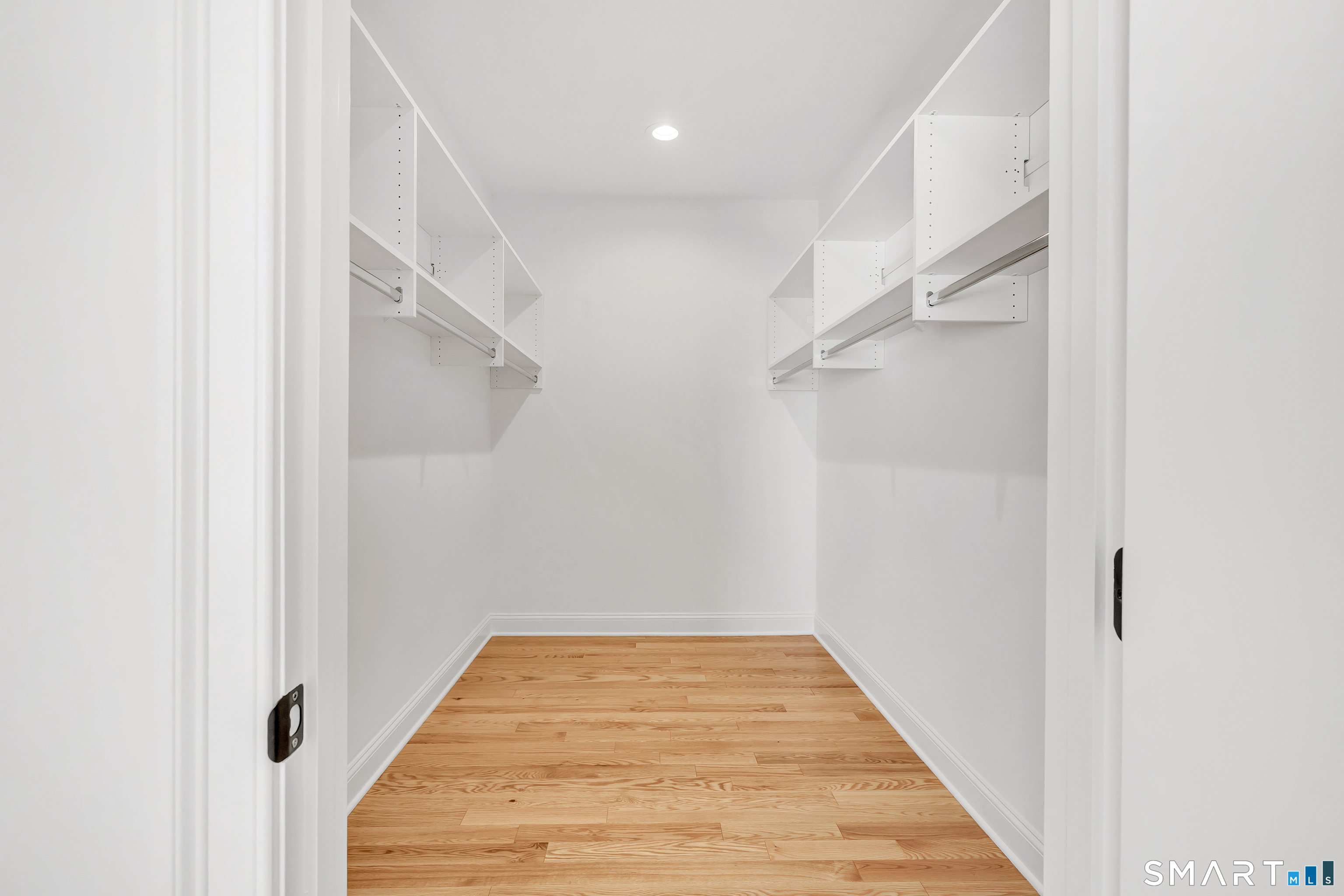 15 Hunting Ridge Road Middlebury, CT 06762 - Photo 29 of 41 a view of a hallway with wooden floor