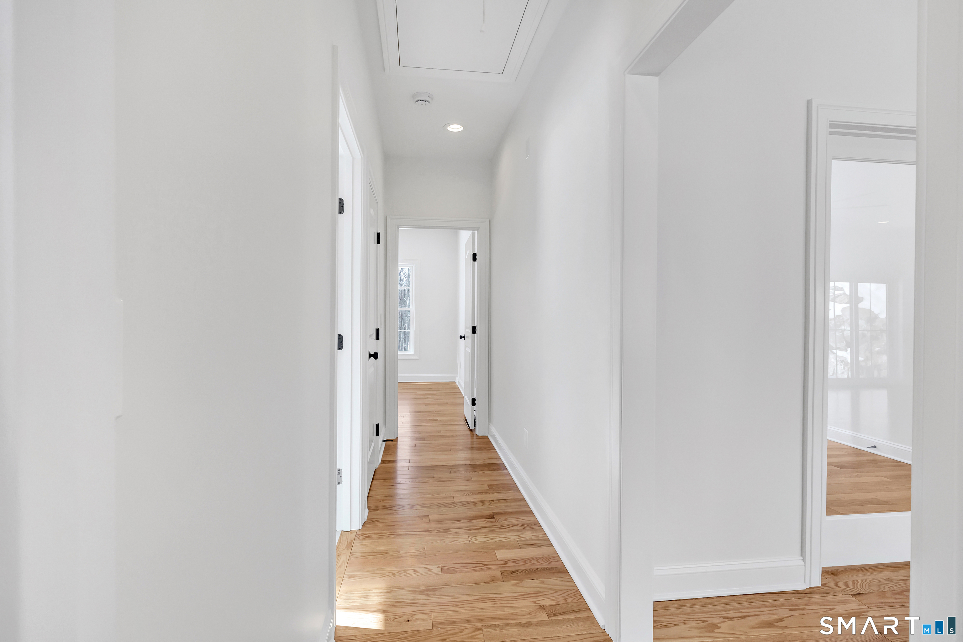 15 Hunting Ridge Road Middlebury, CT 06762 - Photo 35 of 41 a view of a hallway with the wooden floor